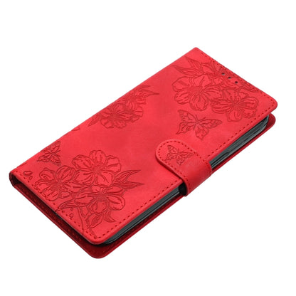 For iPhone 16 Plus Cherry Blossom Butterfly Skin Feel Embossed PU Phone Case(Red) - iPhone 16 Plus Cases by buy2fix | Online Shopping UK | buy2fix